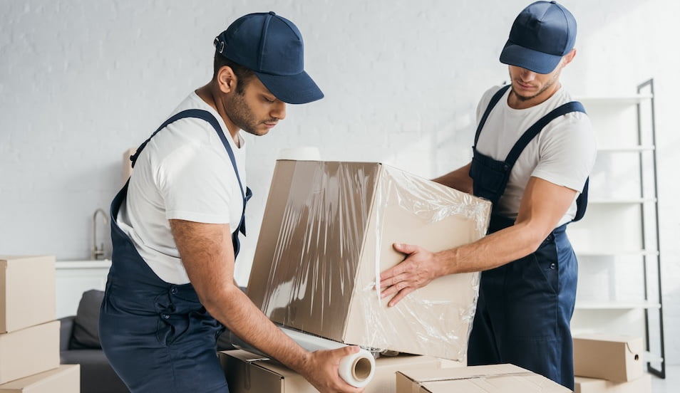 Professional movers loading a moving truck for a residential relocation in Boulder CO